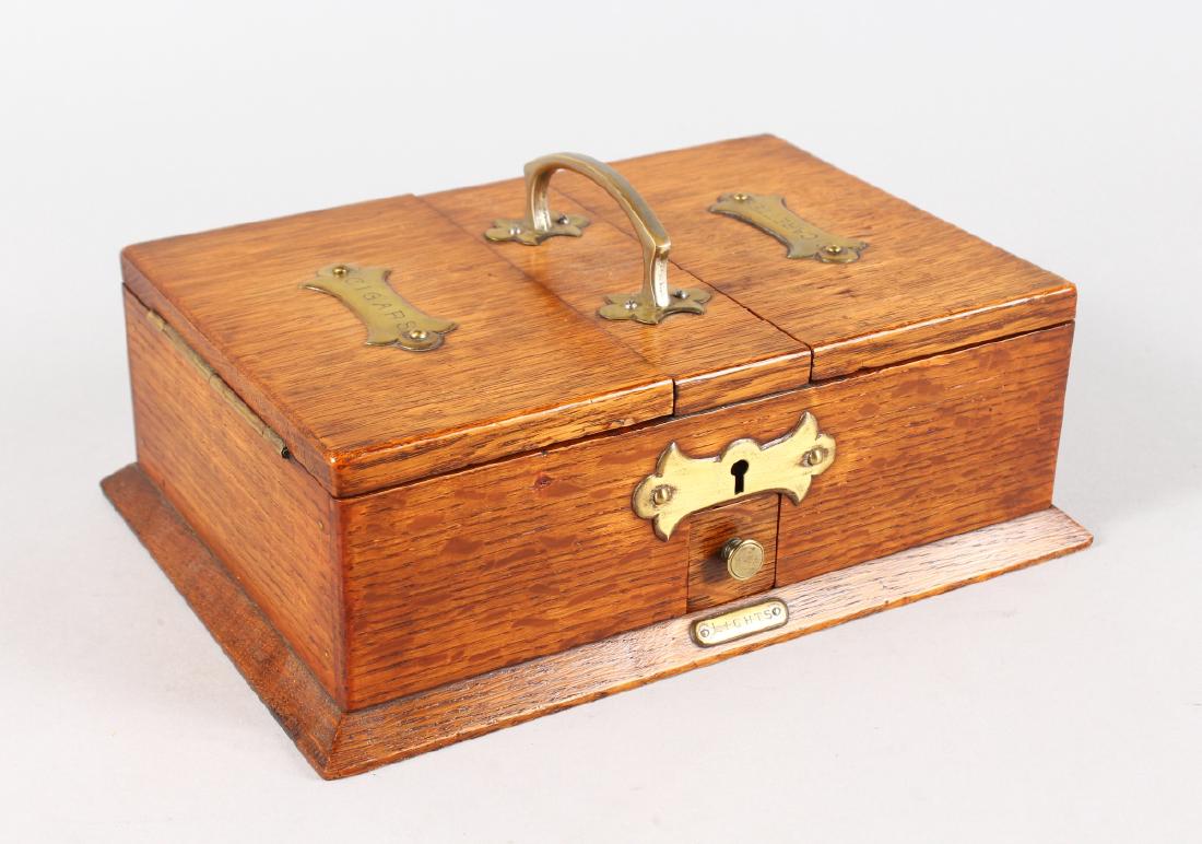 A GOOD OAK CIGAR AND CIGARETTE BOX with brass handles (1 of 8)