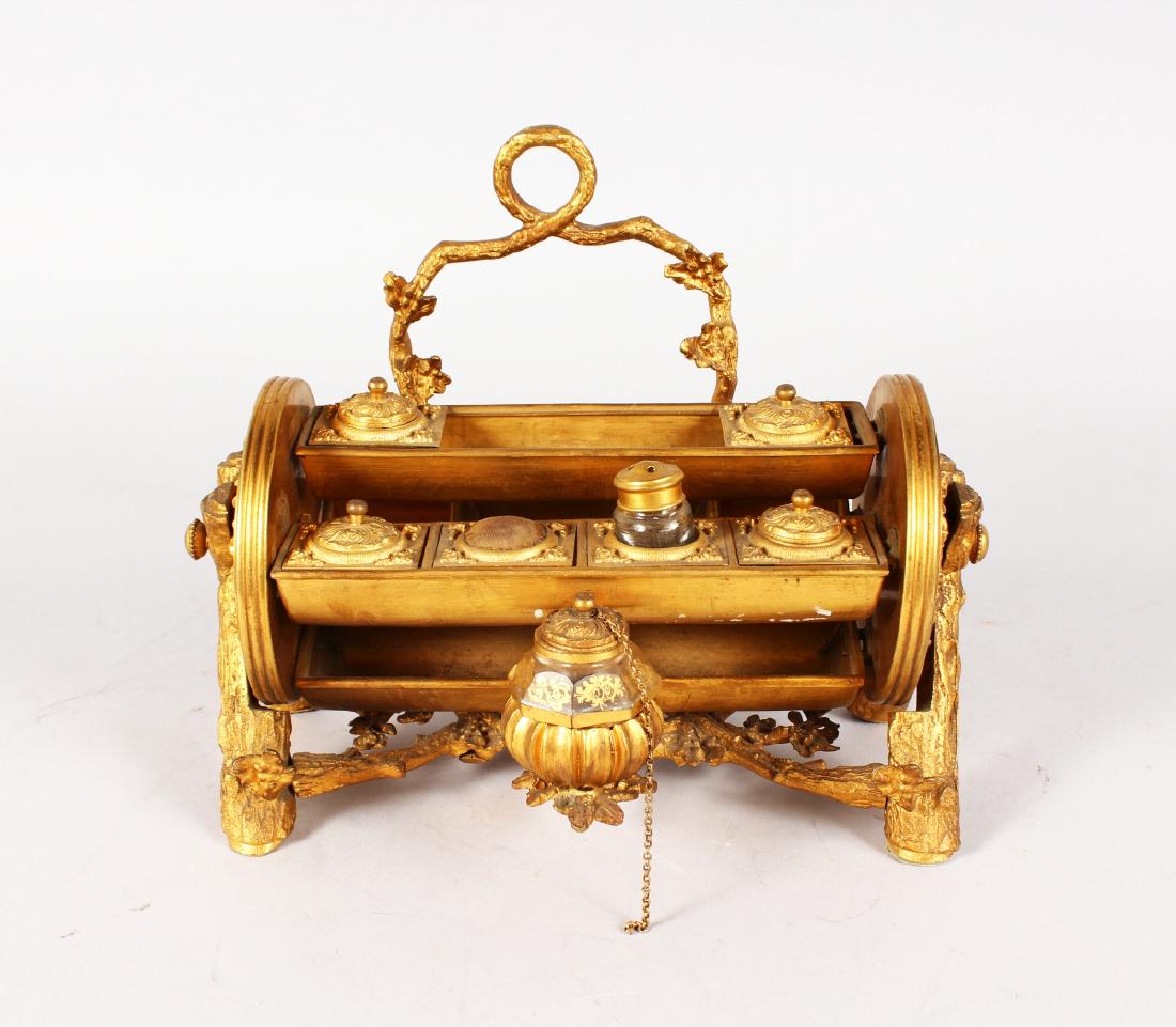 A FRENCH REVOLVING BRONZE INK STAND. 10ins wide. (1 of 4)