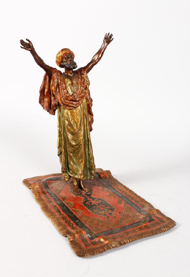 A GOOD BERGMAN BRONZE ARAB FIGURE STANDING ON A PERSIAN (1 of 3)