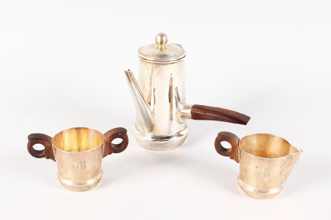 A STERLING SILVER THREE PIECE COFFEE SET comprising (1 of 7)