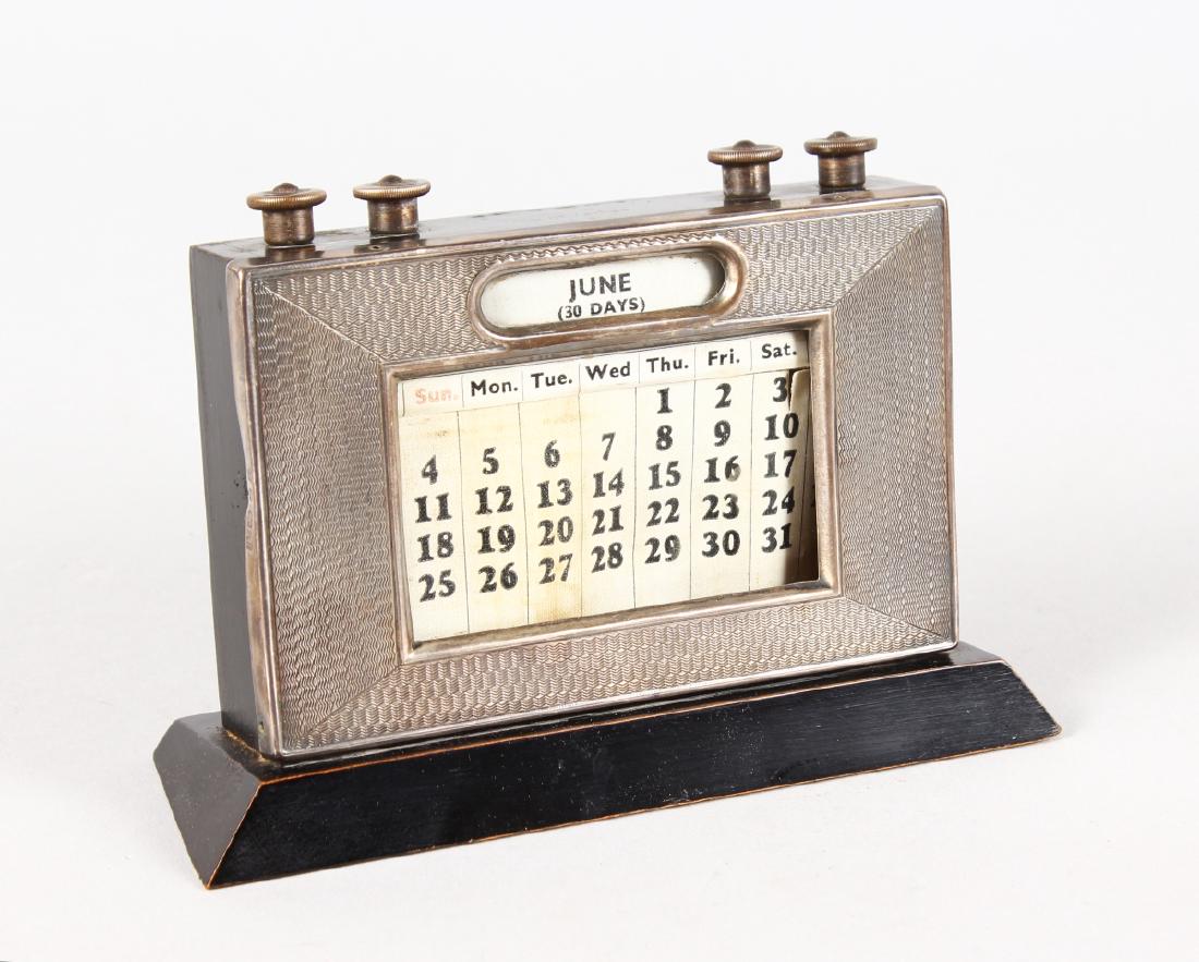 AN ENGINE TURNED SILVER CALENDAR. Birmingham 1932 (1 of 4)