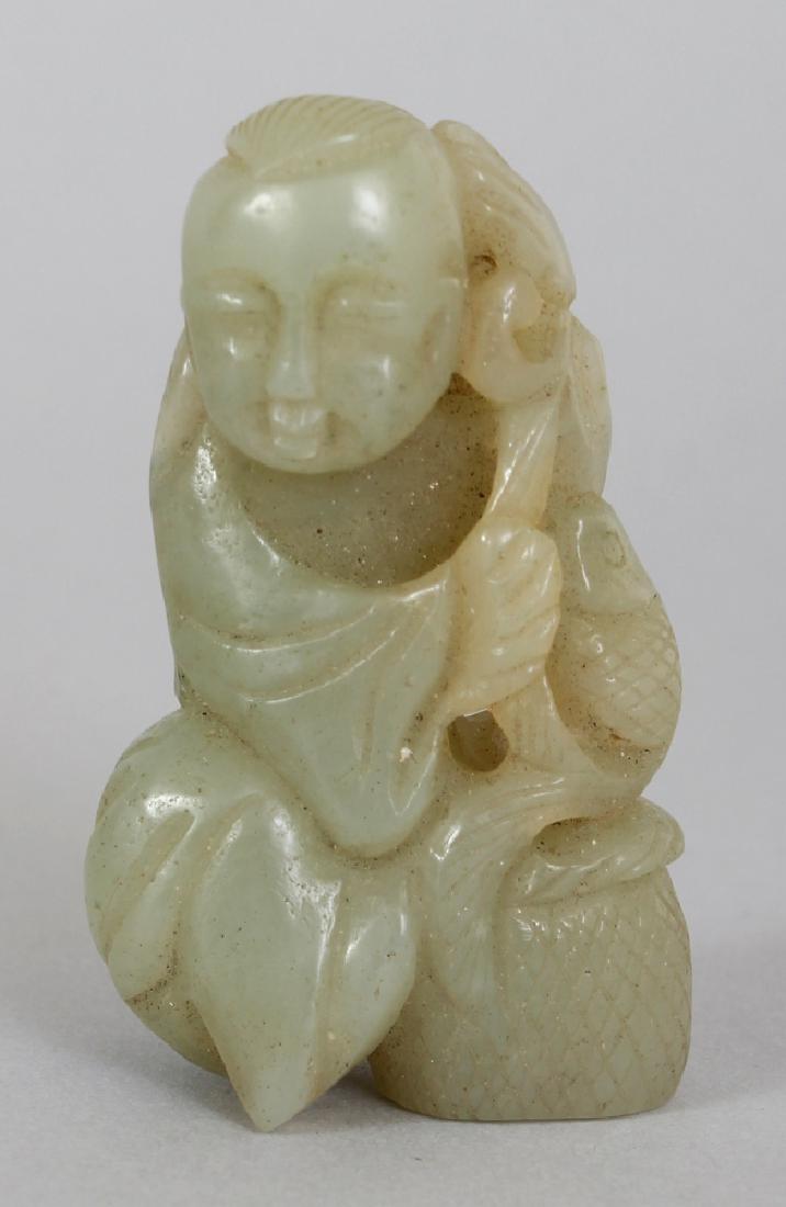 A CHINESE CELADON JADE FIGURE OF A BOY, seated next to (1 of 8)