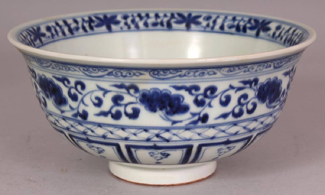 A CHINESE YUAN STYLE BLUE & WHITE PORCELAIN KYLIN BOWL,: A CHINESE YUAN STYLE BLUE & WHITE PORCELAIN KYLIN BOWL, the interior centred by a gambolling kylin, the base unglazed, 7.25in diameter & 3.5in high.