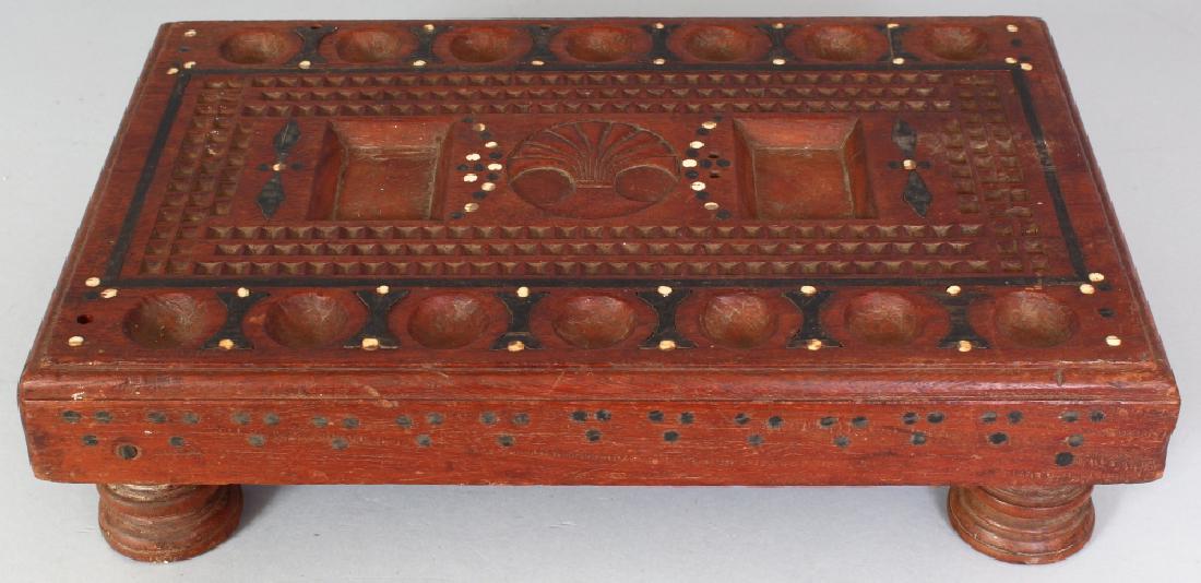 A NORTH AFRICAN BONE & EBONY INLAID LOW RECTANGULAR: A NORTH AFRICAN BONE & EBONY INLAID LOW RECTANGULAR TABLE, possibly a games table, 15.5in x 9.75in x 3.9in high.