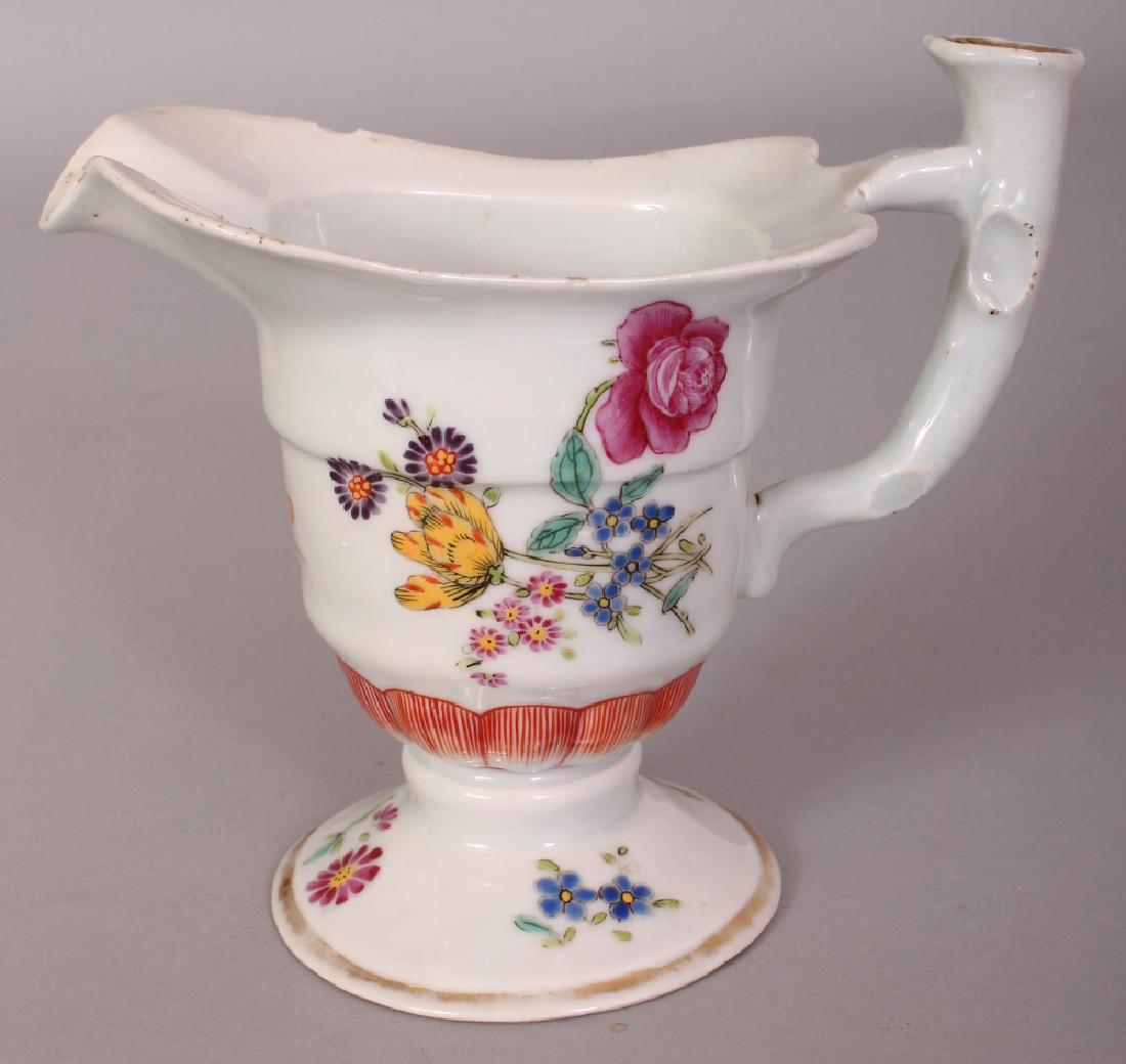AN 18TH CENTURY CHINESE EXPORT QIANLONG PERIOD FAMILLE: AN 18TH CENTURY CHINESE EXPORT QIANLONG PERIOD FAMILLE ROSE PORCELAIN HELMET JUG, the sides painted with floral bouquets, 5in long including handle and spout & 4.5in high to top of handle.