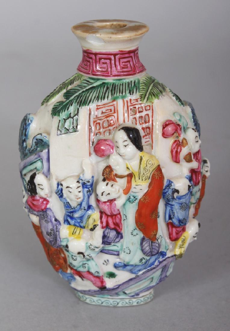 A GOOD QUALITY 19TH CENTURY CHINESE FAMILLE ROSE: A GOOD QUALITY 19TH CENTURY CHINESE FAMILLE ROSE MOULDED PORCELAIN SNUFF BOTTLE, decorated with the legendary scene of four ladies in the company of a multitude of children, the base with an extended 