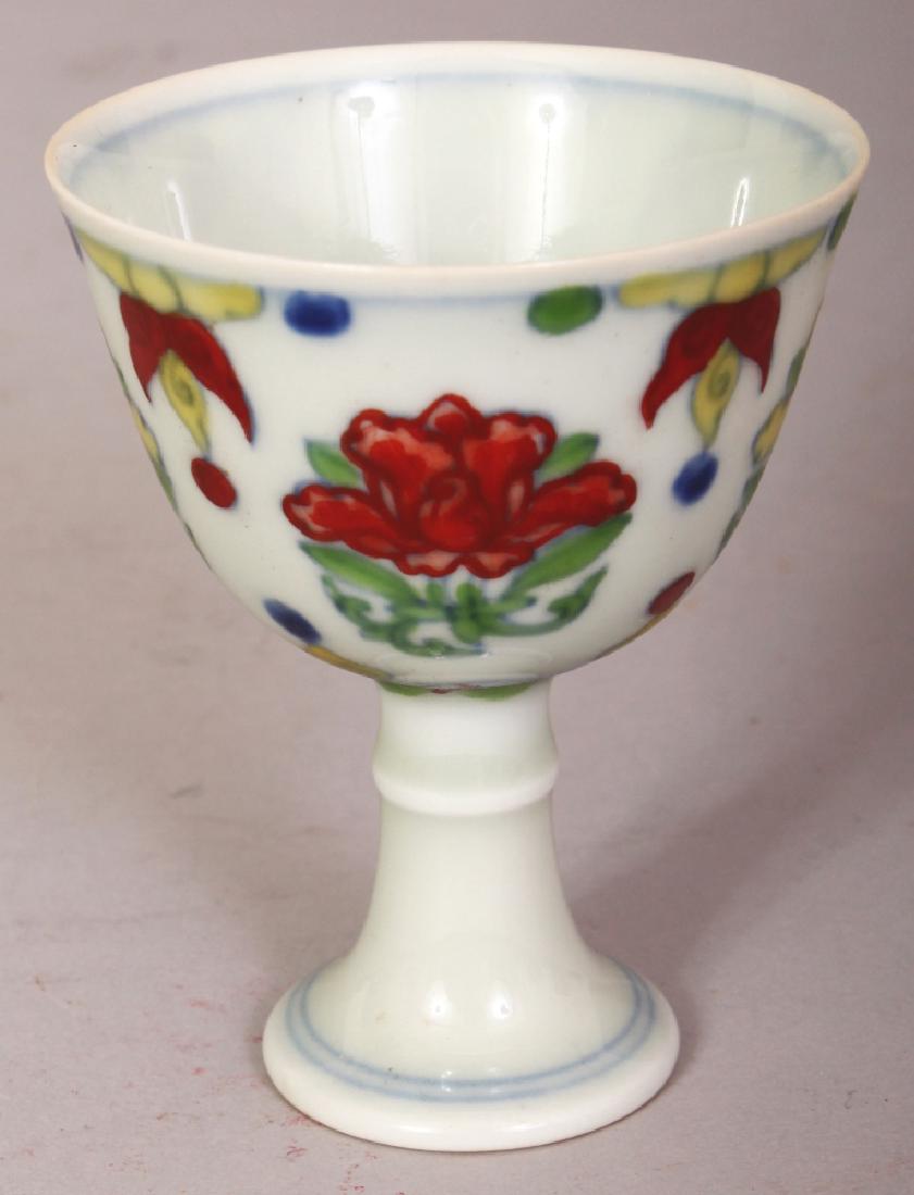 A CHINESE DOUCAI PORCELAIN STEM CUP, the inside of the (1 of 8)