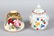 A ROYAL WORCESTER SQUAT TWO HANDLED HADLEY SHAPED VASE