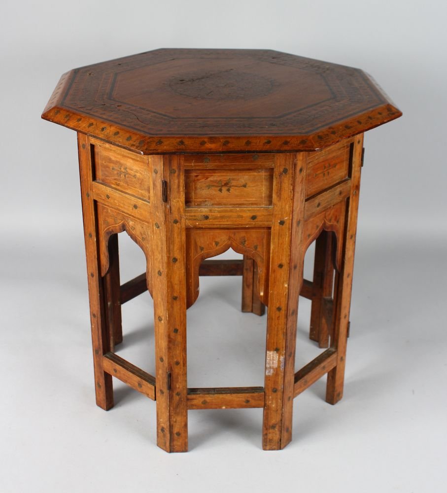 A GOOD ISLAMIC BRASS INLAID OCTAGONAL TABLE.  1ft 6ins (1 of 3)