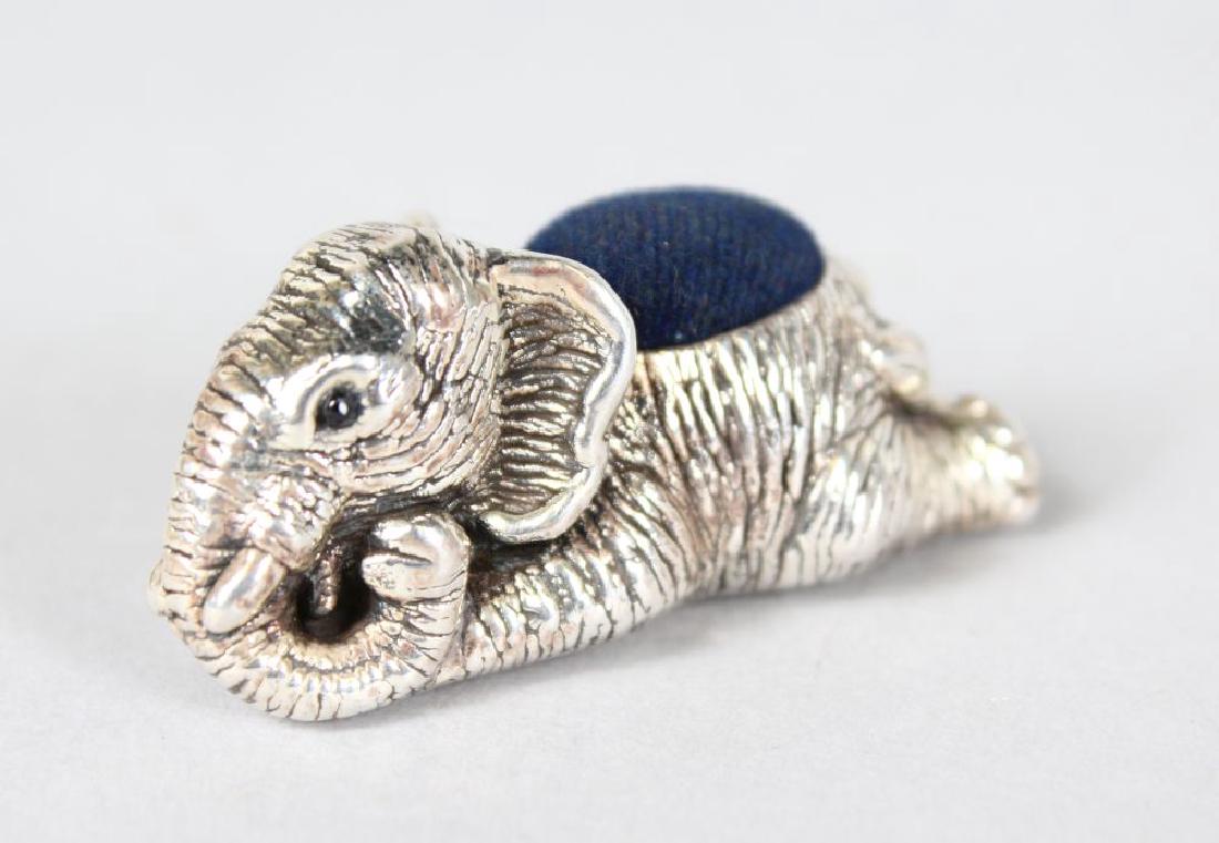 A SILVER ELEPHANT PIN CUSHION.: A SILVER ELEPHANT PIN CUSHION.