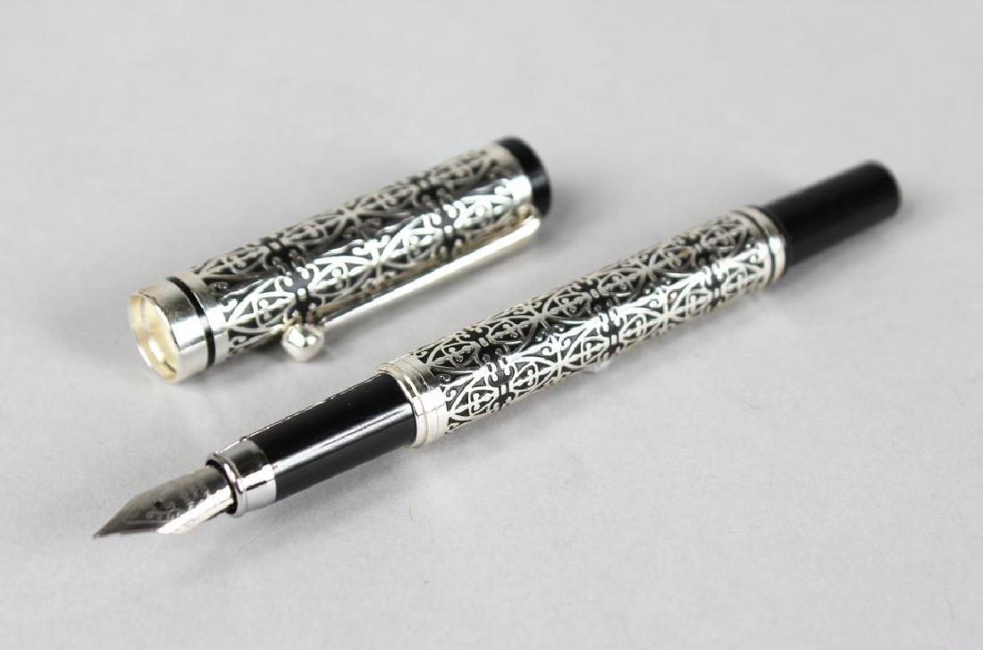 A SILVER OVERLAY GERMAN FOUNTAIN PEN. (1 of 2)