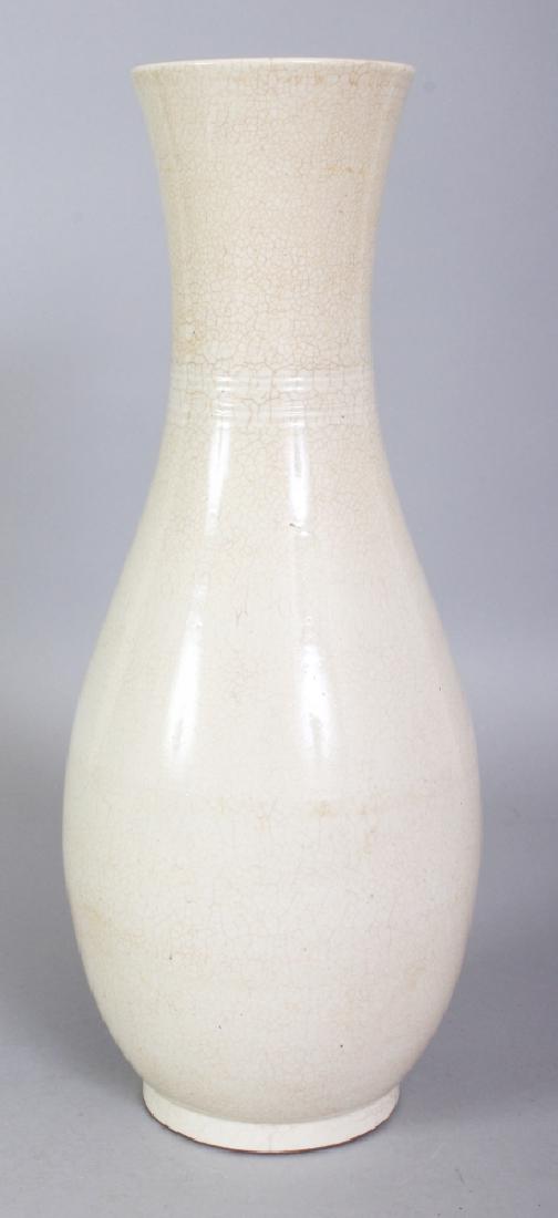 A CHINESE WHITE GLAZED DEHUA STYLE PORCELAIN VASE, the (1 of 5)