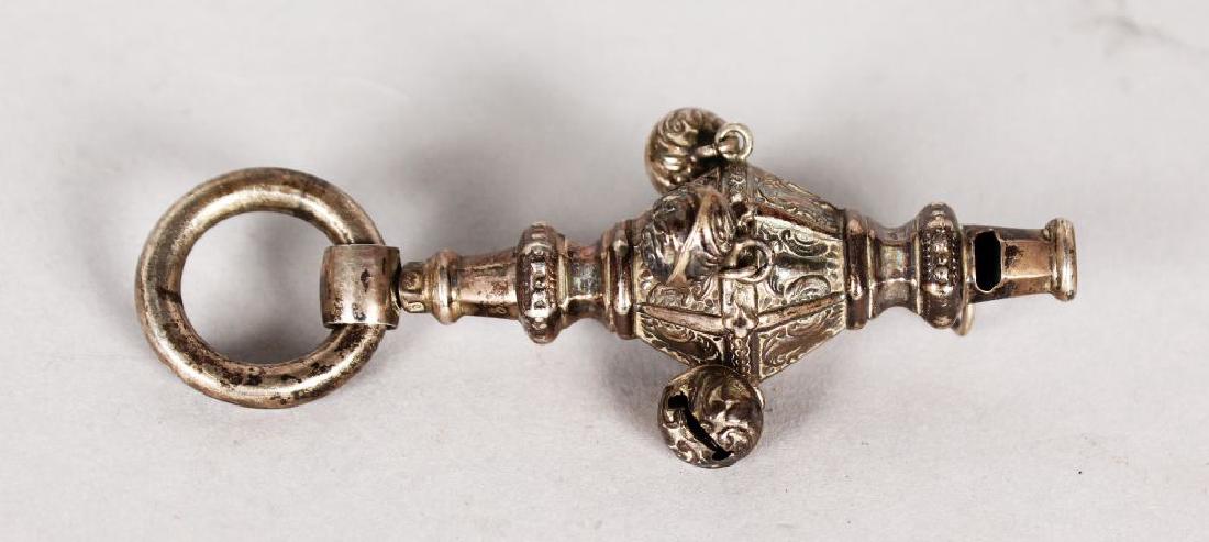 A GOOD VICTORIAN BABIES RATTLE with ring handle.: A GOOD VICTORIAN BABIES RATTLE with ring handle.