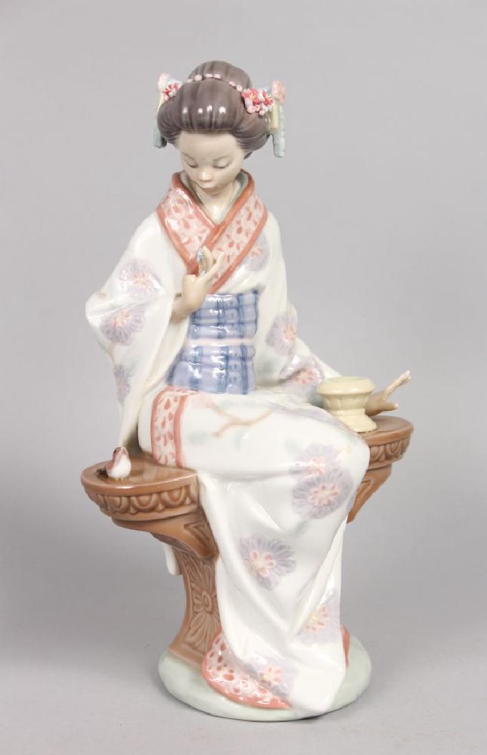 A LLADRO FIGURE "NIPPON LADY". First issued 1985, last: A LLADRO FIGURE "NIPPON LADY". First issued 1985, last year 1998. 9ins high. Fan missing.