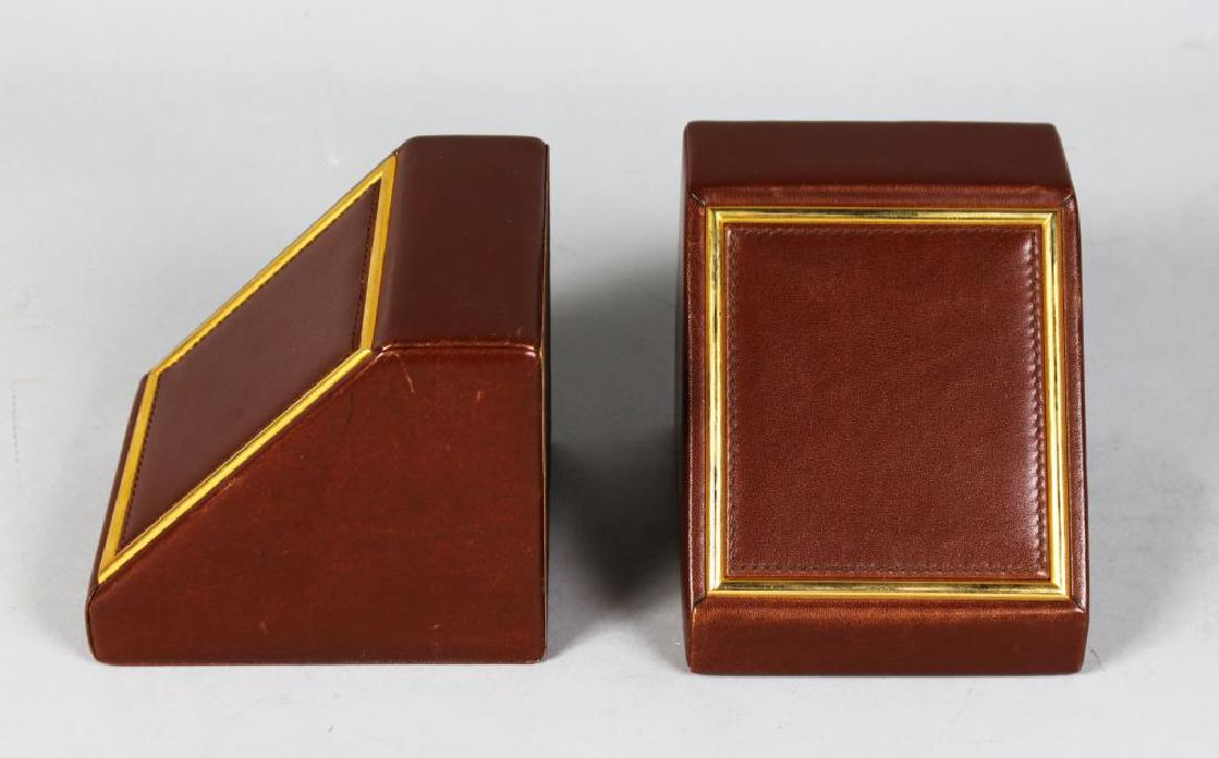 A PAIR OF ASPREY'S BRASS BOUND LEATHER BOOK ENDS. (1 of 1)