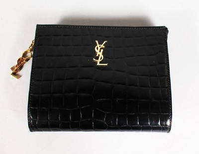 AN YSL BLACK LEATHER CROCODILE CLUTCH BAG.: AN YSL BLACK LEATHER CROCODILE CLUTCH BAG.