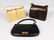 A LADIES BLACK LEATHER CROCODILE HANDBAG, CIRCA. 1960;
