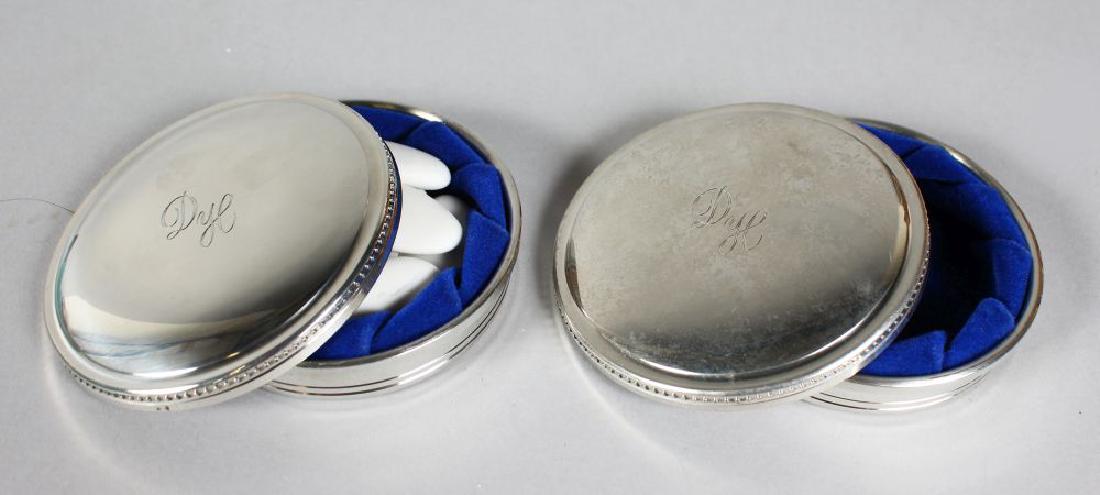 A TIFFANY & CO HANDCRAFTED PEWTER CIRCULAR SWEET BOX,: A TIFFANY & CO HANDCRAFTED PEWTER CIRCULAR SWEET BOX, engraved "Dye", 3ins diameter, and A MATCHING CIRCULAR JEWELLERY BOX, one in original Tiffany box (2).