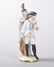 A 19TH CENTURY PORCELAIN PERFUME BOTTLE OF A SOLDIER,