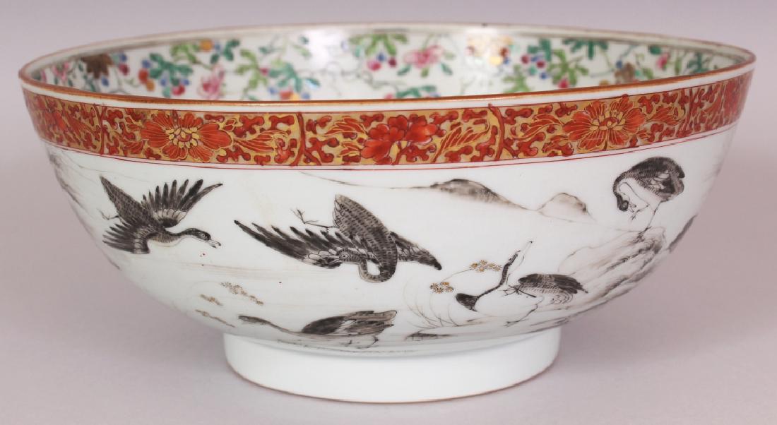 A GOOD CHINESE YONGZHENG PERIOD FAMILLE ROSE &: A GOOD CHINESE YONGZHENG PERIOD FAMILLE ROSE & GRISAILLE PORCELAIN BOWL, circa 1730, the interior painted with carp swimming amidst water weeds within a vine border, the sides painted with an assembly