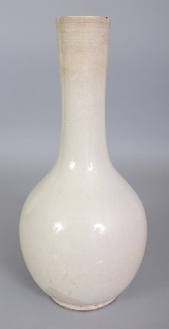 A CHINESE WHITE GLAZED CERAMIC VASE, the sides faintly (1 of 6)