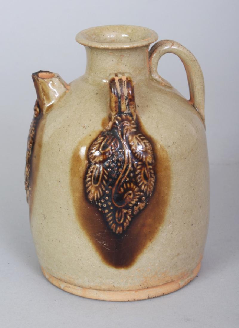 A CHINESE TANG STYLE CHANGSHA WARE EWER, with moulded (1 of 7)