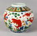 A CHINESE VASE painted with fish. 9.5ins high.