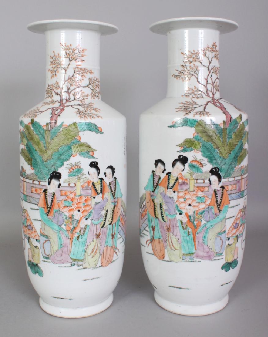 A LARGE MIRROR PAIR OF CHINESE REPUBLIC STYLE FAMILLE: A LARGE MIRROR PAIR OF CHINESE REPUBLIC STYLE FAMILLE ROSE PORCELAIN ROULEAU VASES, 16in high.
