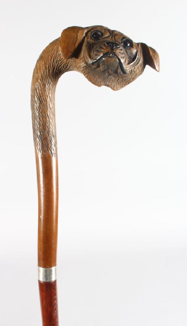 A WALKING STICK WITH DOG HEAD HANDLE. (1 of 3)