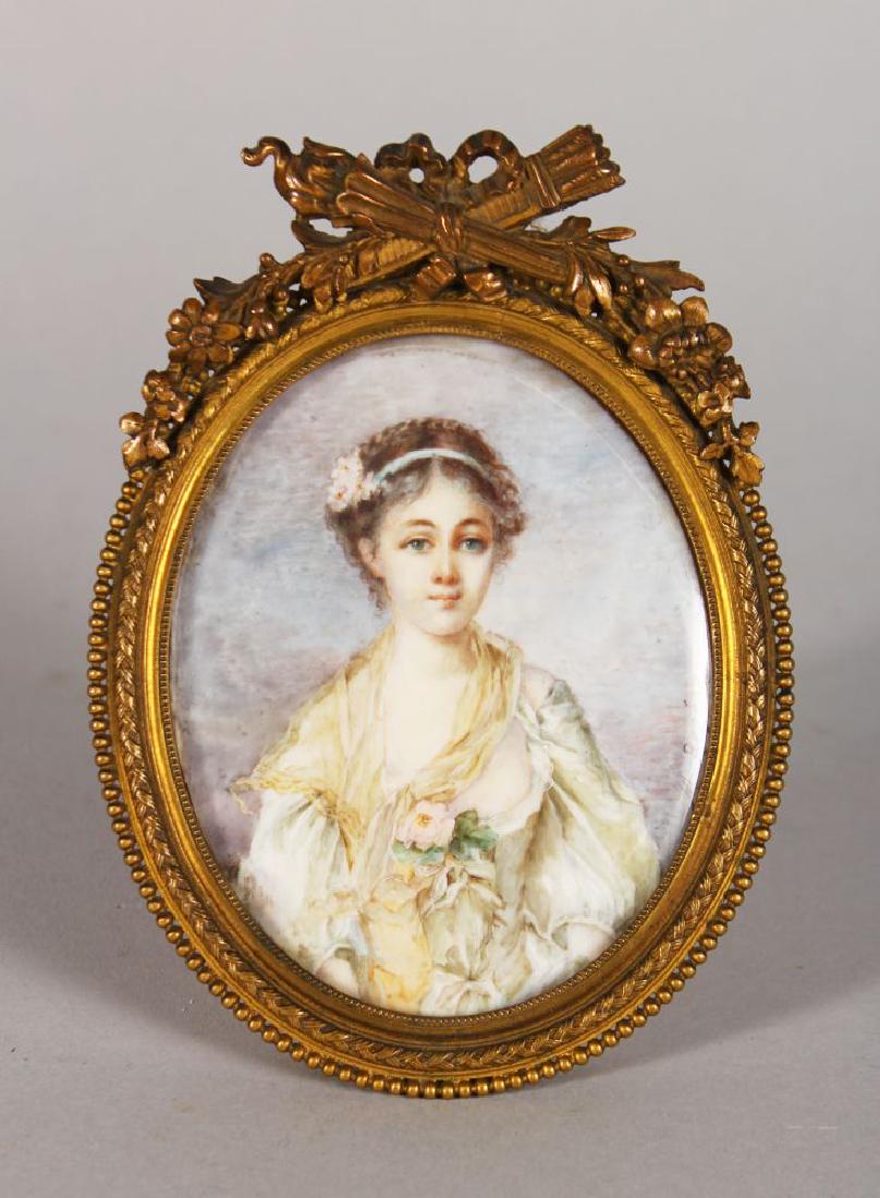 M. ROGE, A LOVELY OVAL PORTRAIT OF A YOUNG LADY, signed: M. ROGE, A LOVELY OVAL PORTRAIT OF A YOUNG LADY, signed 3.5in x 2.75in, in an ornate easel frame