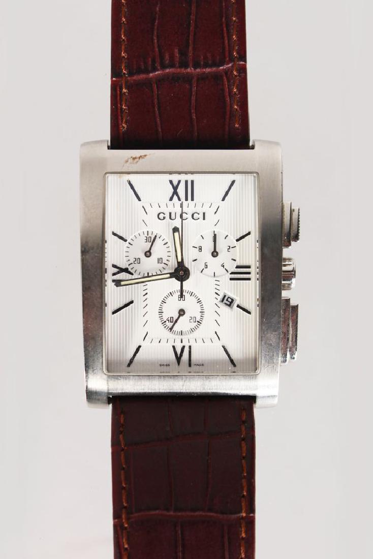 A GUCCI STAINLESS STEEL WRIST WATCH No: 11166398, with (1 of 2)
