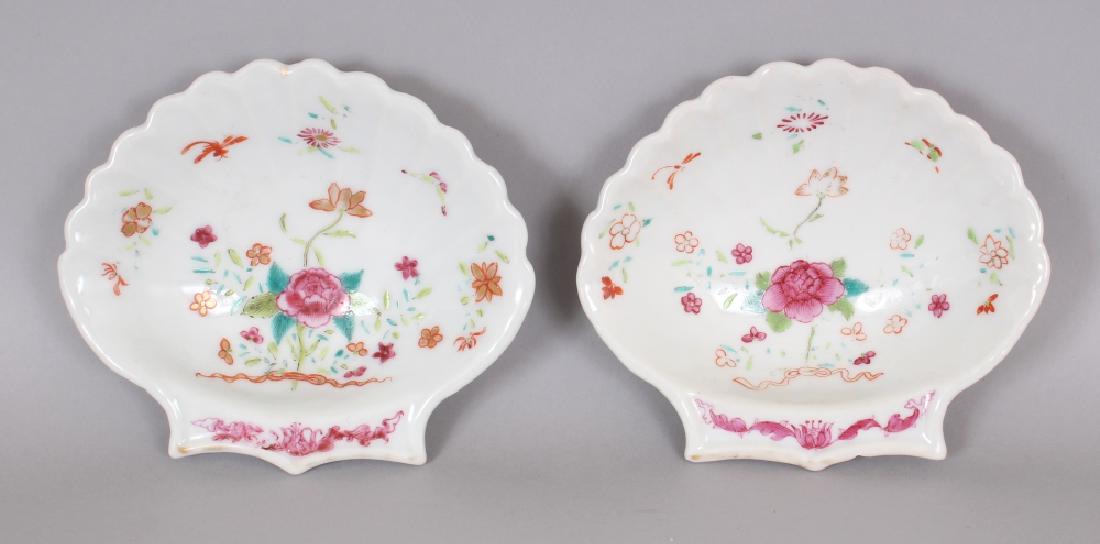 A PAIR OF CHINESE QIANLONG PERIOD FAMILLE ROSE: A PAIR OF CHINESE QIANLONG PERIOD FAMILLE ROSE PORCELAIN SHELL DISHES, each painted with floral sprays, 4.75in wide 4.2in high at widest points.