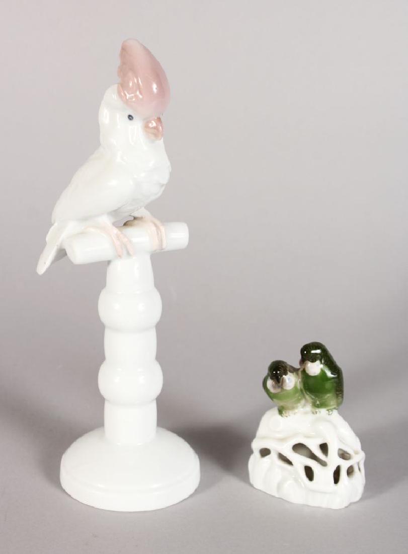 A ROSENTHAL BIRD ON A PERCH, 8ins high, and two birds: A ROSENTHAL BIRD ON A PERCH, 8ins high, and two birds on a rock, 3ins high (2).