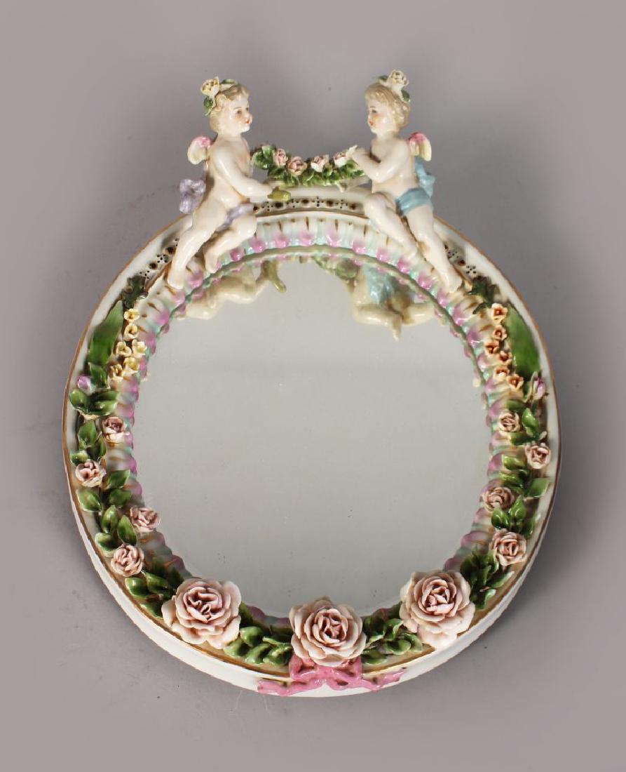 A MEISSEN STYLE PORCELAIN MIRROR, with a pair of (1 of 1)
