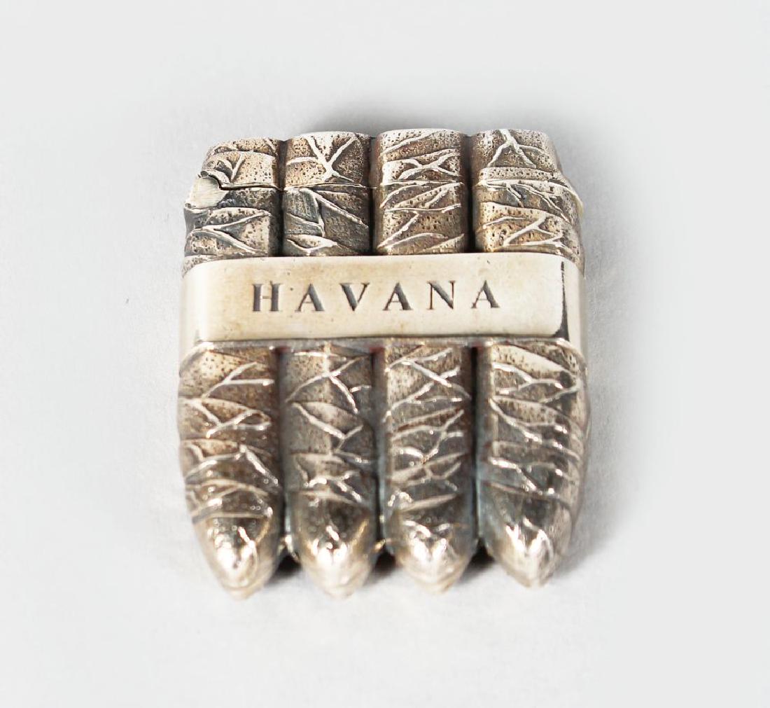A NOVELTY SILVER HAVANA CIGAR CASE.: A NOVELTY SILVER HAVANA CIGAR CASE.