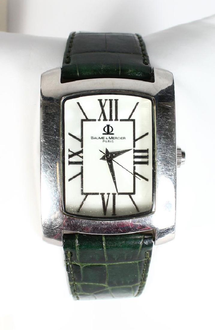 A BAUME & MERCIER WATCH in a presentation box. (1 of 2)