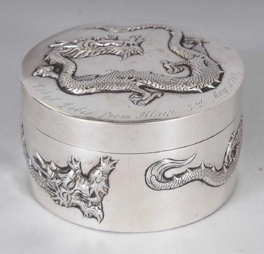 AN EARLY 20TH CENTURY CHINESE CIRCULAR SILVER DRAGON (1 of 9)