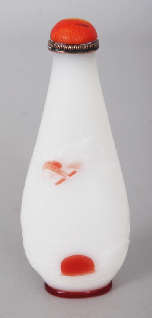 A CHINESE RED OVERLAY OPAQUE WHITE GROUND PEAR FORM (1 of 4)