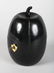 A WOODEN EBONISED MELON TEA CADDY. 7ins high.