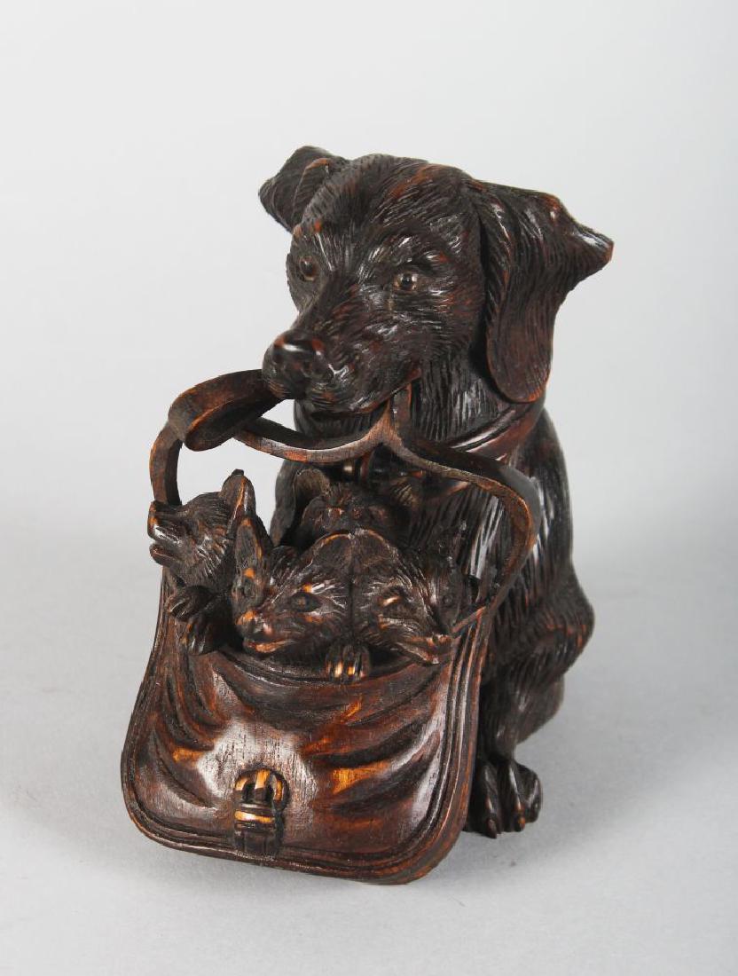 A CARVED WOOD BLACK FOREST DOG WITH PUPPIES INKWELL. (1 of 2)