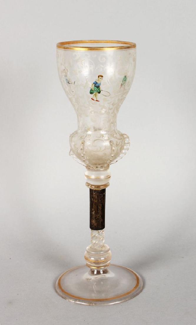 AN EARLY GERMAN GLASS GOBLET, painted with European and (1 of 2)