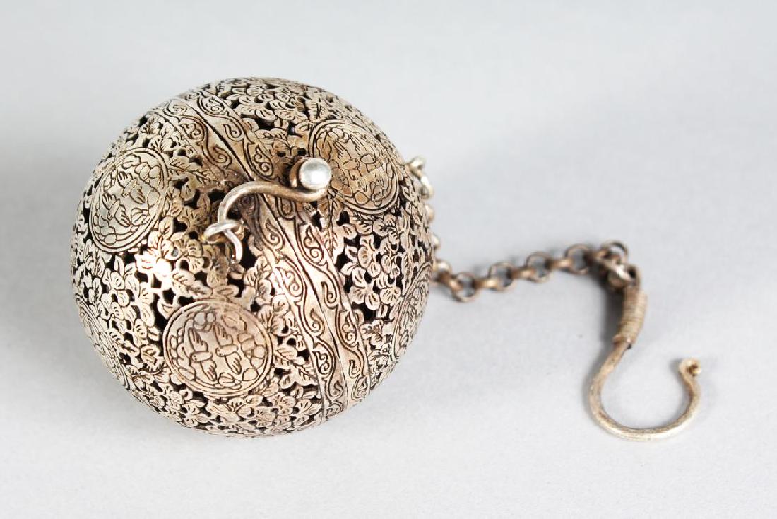 AN ISLAMIC ENGRAVED AND PIERCED BALL TRAVELLING CENSER.: AN ISLAMIC ENGRAVED AND PIERCED BALL TRAVELLING CENSER.