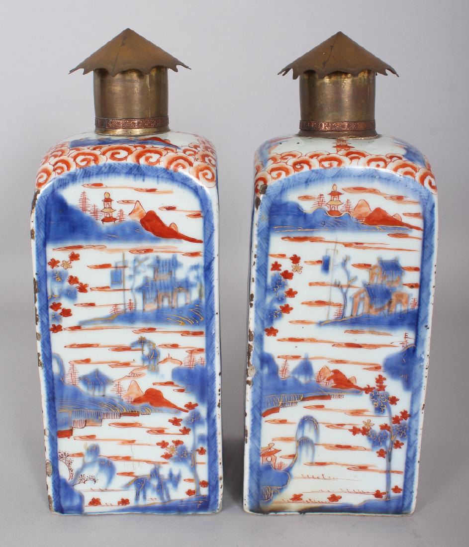 A GOOD PAIR OF LATE 17TH CENTURY CHINESE IMARI KANGXI: A GOOD PAIR OF LATE 17TH CENTURY CHINESE IMARI KANGXI PERIOD SQUARE SECTION PORCELAIN FLASKS, with fitted metal necks and covers, each painted with river landscape scenes, each base unglazed, 4.1in sq