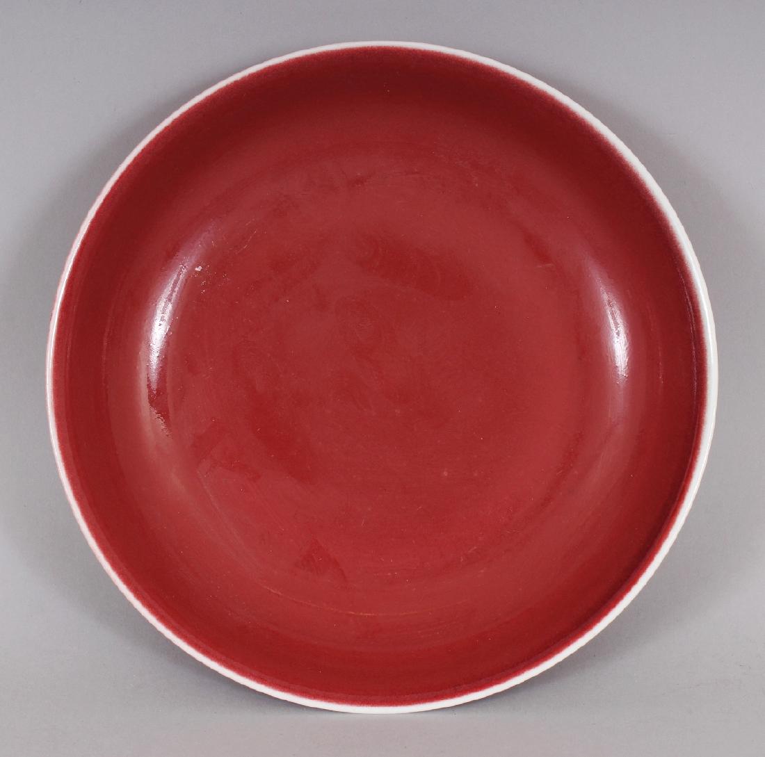 A CHINESE COPPER RED PORCELAIN SAUCER DISH, the glaze (1 of 4)