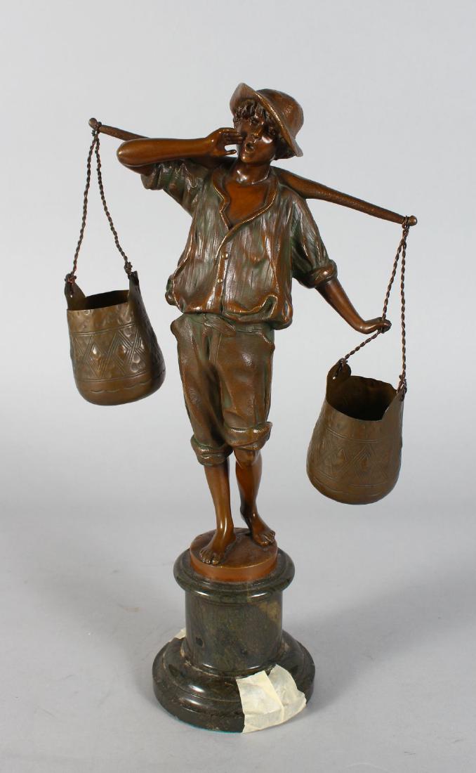 A BRONZE OF A YOUNG BOY "THE WATER CARRIER" on a: A BRONZE OF A YOUNG BOY "THE WATER CARRIER" on a marble pedestal. 15ins high.