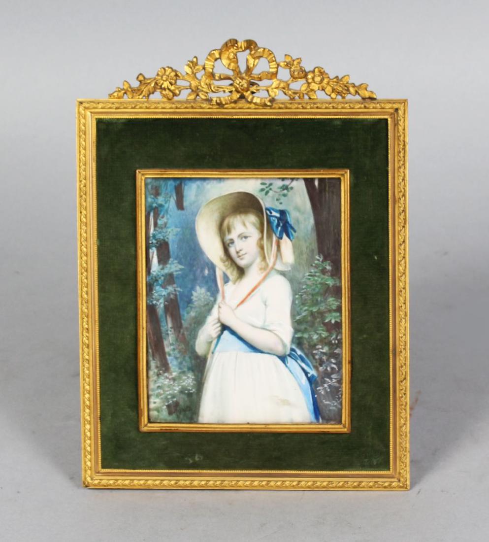 AFTER REYNOLDS, A PORTRAIT MINIATURE OF A YOUNG GIRL in: AFTER REYNOLDS, A PORTRAIT MINIATURE OF A YOUNG GIRL in a wood. Signed Reynolds. 4ins x 3ins, in a very good ormolu and velvet frame.
