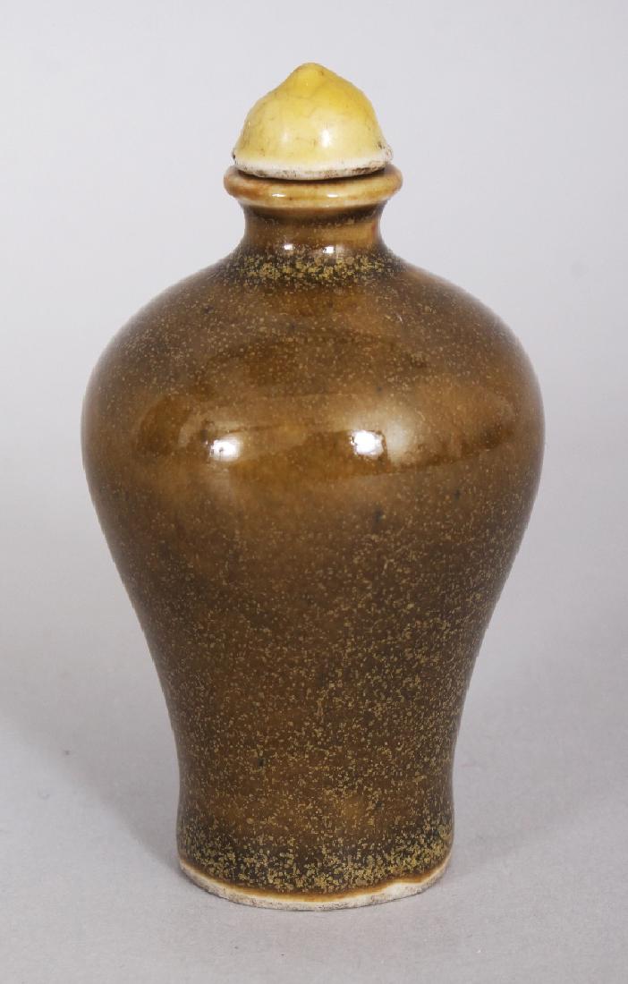 A CHINESE TEA DUST PORCELAIN SNUFF BOTTLE, with a (1 of 4)