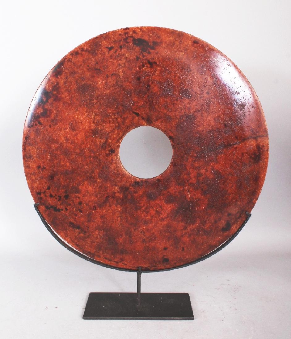 A LARGE CHINESE NEOLITHIC STYLE HARDSTONE BI DISC, (1 of 3)