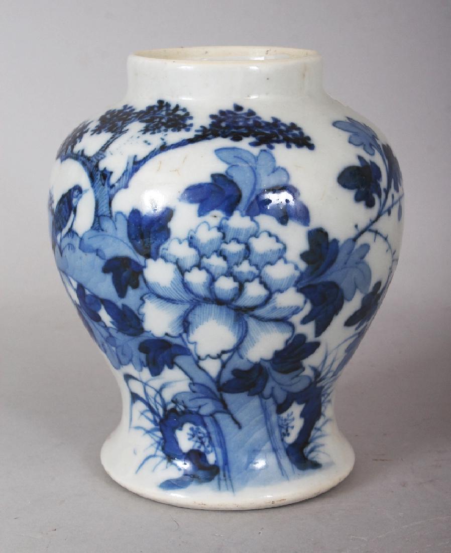 A 19TH CENTURY CHINESE BLUE & WHITE PORCELAIN JAR,: A 19TH CENTURY CHINESE BLUE & WHITE PORCELAIN JAR, painted with a bird, peony and rockwork, 6.5in high.