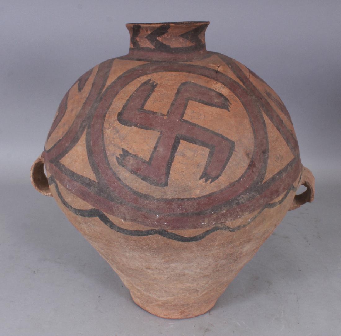 AN EARLY CHINESE PAINTED POTTERY STORAGE JAR, decorated (1 of 6)